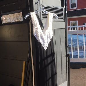 Long black dress. Lacy white on the top.